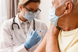Stock photo of person receiving a vaccine