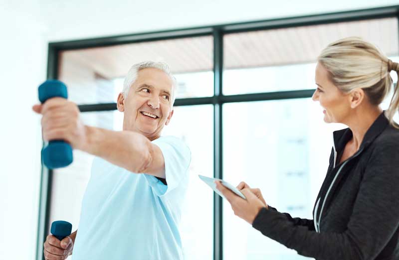 man exercising during cardiopulmonary rehabilitation man exercising during cardiopulmonary rehabilitation